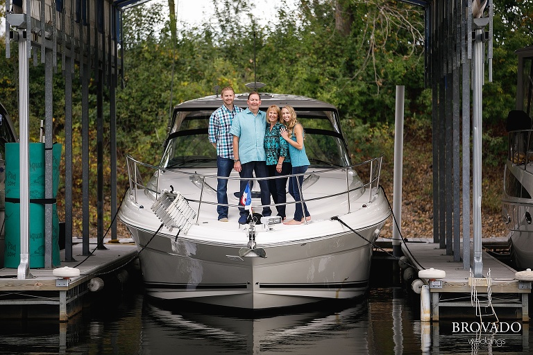 Natalie and her family on their boat in matching blue outfits